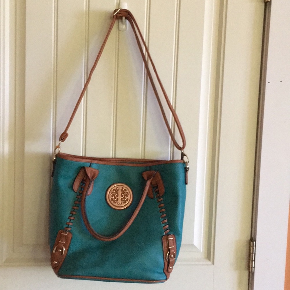 A teal colored Purse